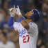 Los Angeles Dodgers' Matt Kemp points to the sky after hitting a three-run home run during the fifth inning of a baseball game against the San Francisco Giants, Wednesday, Sept. 21, 2011, in Los Angeles. (AP Photo/Mark J. Terrill)