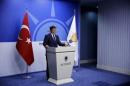 Turkey's Prime Minister Ahmet Davutoglu speaks during a news conference at his ruling AK Party headquarters in Ankara