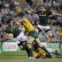South Africa's Springboks' Vermeulen jumps to avoid Australia's Wallabies' Samo as Louw is tackled by Higginbotham during their Rugby Championship test match in Perth