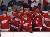 The Detroit Red Wings bench celebrate an empty net goal by Daniel Cleary against the Chicago Blackhawks in the final minute of Game 4 of their NHL Western Conference semi-finals hockey playoff game in Detroit