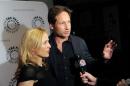 Gillian Anderson and David Duchovny are willing to make a third X-Files movie (Evan Agostini/Invision/AP)