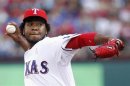 Texas Rangers starting pitcher Neftali Feliz pitches against the Los Angeles Angels in Arlington, Texas