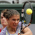 Italy's Sara Errani returns the ball to Arantxa Rus, of The Netherlands, during their first round match of the French Open tennis tournament at the Roland Garros stadium Sunday, May 26, 2013 in Paris. (AP Photo/Michel Euler)