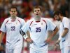 Serbia's Bojan Beljanski and Dalibor Cutura react after their loss to Hungary in their men's handball Preliminaries Group B match at the Copper Box venue during the London 2012 Olympic Games