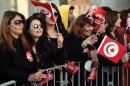 Supporters of newly-elected President Beji Caid Essebsi celebrate after his victory on December 22, 2014 in Tunis