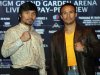 Boxers Juan Manuel Marquez, right, and Manny Pacquiao pose for pictures during a news conference in New York, Wednesday, Sept. 19, 2012. The boxers are promoting their fourth fight, scheduled for Dec. 8, 2012 in Las Vegas. (AP Photo/Seth Wenig)