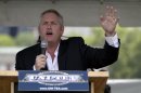 FILE - In a Saturday July 31, 2010 file photo, conservative media publisher and activist Andrew Breitbart speaks to the audience at the 