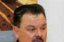 FILE - In this Sept. 15, 2006 file photo, artist Thomas Kinkade unveils his painting, 