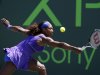 Serena Williams returns the ball to Samantha Stosur, of Australia, during the Sony Ericsson Open tennis tournament, Monday, March 26, 2012, in Key Biscayne, Fla. (AP Photo/Lynne Sladky)