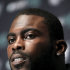 Philadelphia Eagles quarterback Michael Vick looks on during a news conference about his new contract with the NFL football team, Tuesday, Aug. 30, 2011 in Philadelphia. (AP Photo/Alex Brandon)
