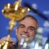 Paul McGinley of Ireland smiles near the Ryder Cup during a news conference after being named the European Ryder Cup captain at the St. Regis in Saadiyat Islands in Abu Dhabi