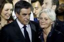 Francois Fillon, former French prime minister, member of The Republicans political party and 2017 presidential candidate of the French centre-right, and his wife Penelope Fillon stand close at the end of a political rally in Paris
