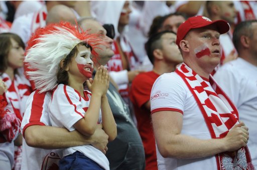 Polish fans react during their Group A Euro 2012 soccer match against Greece in Warsaw
