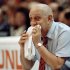 FILE - In this April 2, 1990, file photo, UNLV coach Jerry Tarkanian chews on his towel while watching his Runnin' Rebels run over Duke University in the championship game of the Final Four in Denver. A Las Vegas hospital spokeswoman says doctors have decided to keep storied former UNLV basketball coach Tarkanian overnight for observation after a mild heart attack. Mountainview Hospital spokeswoman Amanda Powell said Tarkanian's status had not changed despite the change from plans to release him on Wednesday, March 21, 2012. (AP Photo/Ed Reinke, File)