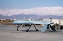 A US Predator drone sets off from its hangar at Bagram air base in Afghanistan
