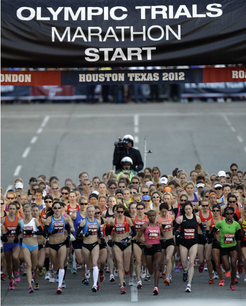 Women competitors start the U.S. Olympic Trials Marathon Saturday, Jan. 14, 2012, in Houston. (AP Photo/David J. Phillip)