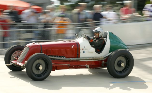 A 1933 Maserati 8 CM race car driven by Kurt Hasler takes part in a race demonstration at the Offene Rennbahn cycling track in Zurich's Oerlikon suburb