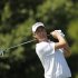 Webb Simpson hits his tee shot on the second hole during the third round of the Tour Championship golf tournament at East Lake Golf Club in Atlanta on Saturday, Sept. 24, 2011. (AP Photo/Dave Martin)