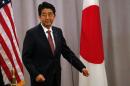Japanese Prime Minister Shinzo Abe said he held "candid" talks with US president-elect Donald Trump in "a very warm atmosphere"