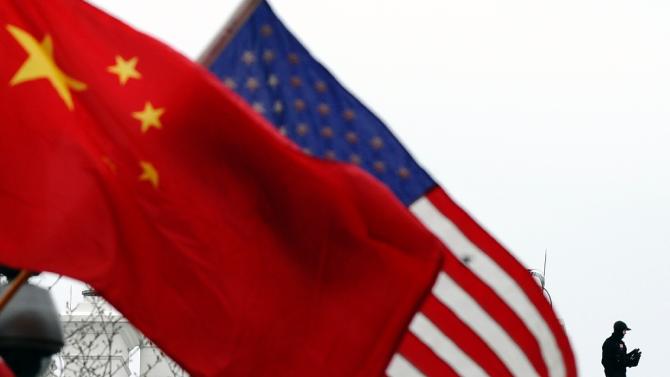 Six Chinese nationals have been charged with economic espionage in a US indictment over suspected theft of mobile phone technology