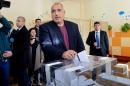 Bulgarian Prime Minister Boyko Borisov casts his vote at a polling station during the presidential elections in Sofia, on November 6, 2016