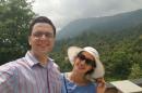 In this photo taken April 10, 2016 and provided by Dr. Omid Moghimi, Dr. Omid Moghimi and his wife, Dorsa Razi pose during their honeymoon in Munnar, Kerala State, India. President Donald Trump's order barring travelers from seven Muslim majority nations from entering the United States has created uncertainty for the newlyweds. Moghimi, a U.S. citizen and internist in New Hampshire, married Razi in Iran. She faced her visa interview this week to come to the United States, but that was abruptly canceled when the order took effect. Moghimi fears it could become permanent. (Dr. Omid Moghimi via AP)