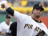 Pittsburgh Pirates' Gerrit Cole throws against the San Francisco Giants in the first  inning of the baseball game on Tuesday, June 11, 2013, in Pittsburgh. It was Cole's major league debut. (AP Photo/Keith Srakocic)