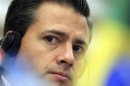 Enrique Pena Nieto attends a media conference after a business meeting at the FIESP (Sao Paulo Industry Federation) in Sao Paulo