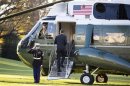U.S. President Obama boards Marine One before departing for a trip to Thailand, Burma and Cambodia from the White House