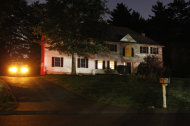 A police car sits in the driveway of the home of 26-year-old Rezwan Ferdaus, in Ashland, Mass., Wednesday, Sept. 28, 2011. Ferdaus has been arrested and accused of plotting to destroy the Pentagon and the U.S. Capitol with large remote-controlled aircraft filled with explosives. (AP Photo/Steven Senne)