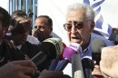 UN-Arab League peace envoy for Syria Brahimi speaks to the media during his visit to the Al Zaatri refugee camp in the Jordanian city of Mafraq