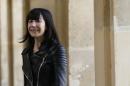 French designer Bouchra Jarrar appears at the end of her Haute Couture Fall/Winter 2014-2015 fashion show in Paris