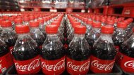 Bottles of Coca-Cola are seen in a warehouse at the Swire Coca-Cola facility in Draper, Utah, March 9, 2011.  REUTERS/George Frey