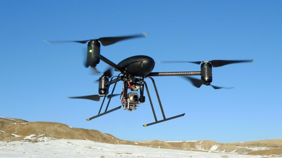 In this Jan. 8, 2009, photo provided by the Mesa County, Colo., Sheriff's Department, a small Draganflyer X6 drone is photographed during a test flight in Mesa County, Colo., with a Forward Looking Infer Red payload. People who fire guns at drones are endangering the public and property and could be prosecuted or fined, the Federal Aviation Administration warned Friday, July 19, 2013, in response to a proposed ordinance in a small Colorado town that would encourage hunters to shoot down drones. In a statement released in response questions about an ordinance under consideration in the farming community of Deer Trail, the FAA reminded the public that it regulates the nation’s airspace, including the airspace over cities and towns.(AP Photo/Mesa County Sheriff's Unmanned Operations Team)