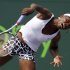 Venus Williams returns to Aleksandra Wozniak, of Canada, during the Sony Ericsson Open tennis tournament in Key Biscayne, Fla., Sunday, March 25, 2012. (AP Photo/Alan Diaz)