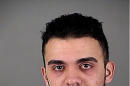 Samy Mohamed Hamzeh is seen in an undated photo provided by the Waukesha County (Wis.) Sheriff's Department. Federal prosecutors charged 23-year-old Samy Mohamed Hamzeh on Tuesday, Jan. 26, 2016, with unlawfully possessing a machine gun and receiving and possessing firearms not registered to him. Federal agents said Tuesday that Mohamed Hamzeh wanted to storm a Masonic temple with a machine gun and kill at least 30 people in an attack he hoped would show "nobody can play with Muslims" and spark more mass shootings in the United States. (Waukesha County (Wis.) Sheriff's Department via AP)