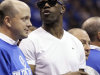 FILE - This June 5, 2011 file photo shows Terrell Owens watching during the second half of Game 3 of the NBA Finals basketball game between the Miami Heat and the Dallas Mavericks,  in Dallas. While Owens still waits for an NFL team to contact him, the 15-year veteran receiver has focused his attention toward an acting career. (AP Photo/Mark Humphrey, File)