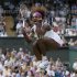 Serena Williams of the U.S. celebrates after defeating Zheng Jie of China in their women's singles tennis match at the Wimbledon tennis championships in London