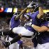 Baltimore Ravens running back Ray Rice, center, celebrates his touchdown with Torrey Smith, left, and Marshal Yanda in the first half of an NFL football game against the Cincinnati Bengals in Baltimore, Monday, Sept. 10, 2012. (AP Photo/Nick Wass)