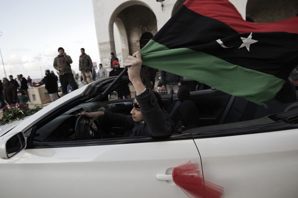 صور لاحتفالات الليبيين بمرور عام على ثورتهم ضد القذافي  139067970-jpg_171122