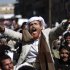 An elderly protester chants slogans during a demonstration demanding the prosecution of Yemen's President Ali Abdullah Saleh in Sanaa, Yemen, Sunday, Dec. 25, 2011. (AP Photo/Hani Mohammed)