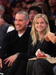 Jim Toth and Reese Witherspoon attend a game between the Detroit Pistons and the Los Angeles Lakers at Staples Center in Los Angeles on January 4, 2011  -- Getty Premium