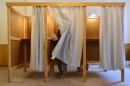 A woman leaves a polling booth in Stoessen, eastern Germany, on March 13, 2016 during the state elections in Saxony-Anhalt