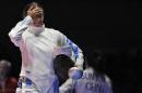 Rossella Fiamingo of Italy celerates after defeating Sun Yiwen of China in the women's individual epee fencing semifinal event at the 2016 Summer Olympics in Rio de Janeiro, Brazil, Saturday, Aug. 6, 2016. (AP Photo/Andrew Medichini)