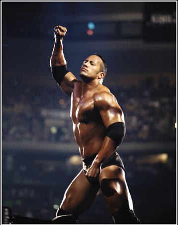 أفضل 10 مصارعيين في تاريخ المصارعة الحرة WWE Therockbottom2528252529-jpg_190430