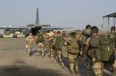 Handout shows French troops preparing to board a transport plane in N'Djamena, Chad