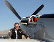 INCLUDES ADDITION THAT PILOT WAS KILLED IN CRASH-This Wednesday, Sept. 15, 2010 photo, shows long time Reno Air Race pilot Jimmy Leeward with his P51 Mustang. A spokesman for Reno's National Championship Air Races says the P-51 Mustang that crashed into a box seat area at the front of the grandstand Friday, Sept. 16, 2011, at the air race was piloted by Leeward. An official reported Friday that Leeward was killed in the crash. (AP Photo/The Reno Gazette-Journal, Marilyn Newton)
