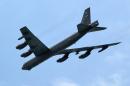 A US Air Force B-52 bomber flies past during the opening day of the Singapore Airshow in Singapore on February 14, 2012