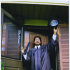 FILE - In this 1999 file family photo provided by the Center for Constitutional Rights, Majid Khan gestures during his high school senior year in Baltimore, MD.  The former Maryland resident accused of joining al-Qaida and plotting to blow up fuel tanks in the U.S. would serve no more than 25 years under a pretrial agreement.  Khan is to be arraigned Wednesday Feb.  29, 2012 at Guantanamo Bay on charges that include conspiracy and murder. (AP Photo/The Khan Family, Center for Constitutional Rights, File)