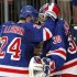 New York Rangers right wing Ryan Callahan (24) congratulates goalie Henrik Lundqvist after the Rangers shut out the New Jersey Devils 3-0 in Game 1 of their NHL hockey Stanley Cup Eastern Conference finals playoff series at New York's Madison Square Garden, Monday, May 14, 2012. (AP Photo/Kathy Willens)